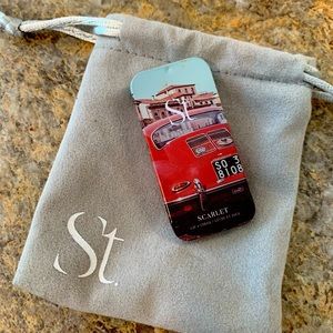 New never opened or used seint lip and cheek in scarlet